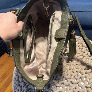 Olive green Michael Kors bag.